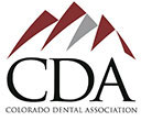 The image shows a logo with the acronym  CDA  prominently displayed, suggesting it is associated with Colorado Dental Association. The design includes a stylized mountain range and the text  Colorado Dental Association  beneath the acronym. The logo has a professional and formal appearance, typical of corporate branding.